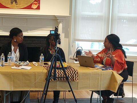 three people at a table